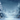 A picturesque illustration of a snow-covered forest scene during heavy snowfall. Two prominent pine trees, blanketed in white snow, flank the foreground, with more blurred trees visible in the soft background. Numerous sparkling golden and white lights are scattered throughout the mid-ground, creating a magical bokeh effect above a vast expanse of pristine, glistening snow, all set under a dark blue sky.