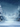 A picturesque illustration of a snow-covered forest scene during heavy snowfall. Two prominent pine trees, blanketed in white snow, flank the foreground, with more blurred trees visible in the soft background. Numerous sparkling golden and white lights are scattered throughout the mid-ground, creating a magical bokeh effect above a vast expanse of pristine, glistening snow, all set under a dark blue sky.