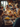 A vibrant, warm-toned photograph depicting a multigenerational family seated around a richly laden dining table during a holiday feast. The table is abundant with dishes including a roasted turkey, side dishes, and drinks, all softly illuminated by natural window light and decorative overhead bulbs, creating a cozy and inviting atmosphere.