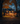 A two-story house is shown at dusk, decorated for Halloween. Pumpkins line the walkway and front lawn. Warm light shines from the windows, and autumn-colored leaves adorn the trees surrounding the house, creating a cozy and festive atmosphere.