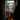 Five children in Halloween costumes stand at the threshold of a doorway, eagerly awaiting candy. Three of the children are in the front, holding trick-or-treat bags, while two others peek out from behind. A blurred figure stands in the foreground on the right, presumably the homeowner about to open the door. Outside, a suburban neighborhood is visible with a white house and trees with autumn foliage.