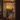 A medium shot photograph taken from inside a home looking out through an open glass doorway onto a family celebration on an outdoor patio. A table covered with food takes up most of the view, with several people around the table talking, while the warm sunlight filters through colorful autumn leaves on the trees outside. The scene has a warm and inviting atmosphere.