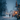 A picturesque vertical shot of a person walking away from the viewer on a snow-covered street at night. The street is lined with traditional houses and bare trees, all illuminated by countless warm, golden Christmas lights, creating a magical and cozy winter wonderland atmosphere under gently falling snow.