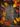 A top-down view of a rustic wooden background framed by vibrant autumn leaves and berries. The leaves display rich shades of red, orange, and yellow, complemented by clusters of bright red and yellow-orange berries and small dark twigs, creating a colorful, seasonal border around the weathered gray-brown wood.