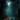 A full moon shines brightly through a misty, dark forest canopy at night. A winding dirt path covered with fallen orange and brown autumn leaves leads into the deep woods, disappearing into the thick blue-green fog. The scene evokes a mysterious and tranquil atmosphere.