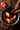An overhead shot shows a silver pot on a dark wooden surface, filled with dark red mulled wine. Floating in the wine are two red and yellow apple slices, one vibrant orange slice, several brown cinnamon sticks, and dark brown star anise. Small bubbles are visible on the surface of the simmering drink, creating a warm, inviting, and rustic festive scene.