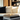 Professional elegant modern living room with stacked books - high-quality image for marketing and content creation
