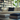 Professional stylish living room: books, sofa, and natural light - high-quality image for marketing and content creation