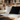 Professional cozy reading nook with books and sofa - high-quality image for marketing and content creation