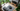 Professional modern biophilic living room with lush jungle view - high-quality image for marketing and content creation
