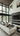 Professional luxurious modern living room with forest views - high-quality image for marketing and content creation