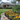 Professional vibrant residential front yard with colorful flower bed - high-quality image for marketing and content creation