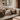 Professional cozy minimalist sofa by sunny window - high-quality image for marketing and content creation