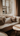 Professional cozy minimalist sofa by sunny window - high-quality image for marketing and content creation