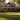 Professional idyllic craftsman home with lush lawn at golden hour - high-quality image for marketing and content creation