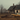 Professional abandoned farmhouse with vintage car on desolate field - high-quality image for marketing and content creation