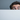 Professional surprised man peeking over blank white sign - high-quality image for marketing and content creation