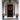 A symmetrical, eye-level shot of the front entrance of an elegant home decorated for autumn. A glossy black paneled door is centered, featuring a vibrant red, orange, and yellow floral wreath, flanked by white-framed sidelights reflecting colorful trees. Two large white fluted columns support a white arched portico, while the surrounding walls are textured grey stone, and the dark grey flagstone porch holds two black urns with matching fall foliage.