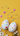 A vibrant overhead flat lay photograph showcases two white eggs decorated with numerous small, multi-colored heart shapes on a bright yellow surface. Three pink puffy hearts and scattered heart-shaped confetti in various colors float above and around the eggs, while fresh white daisy-like flowers with yellow centers are visible in the bottom left corner, creating a joyful and celebratory scene.