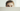 Professional curious young woman's eyes peeking over barrier - high-quality image for marketing and content creation