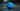 Professional blue sad face sphere on dark textured ground - high-quality image for marketing and content creation